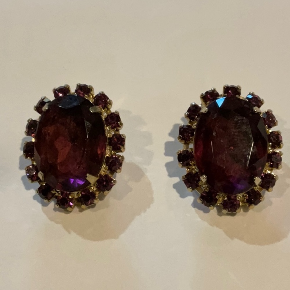 Vintage women’s clip earrings with purple stone